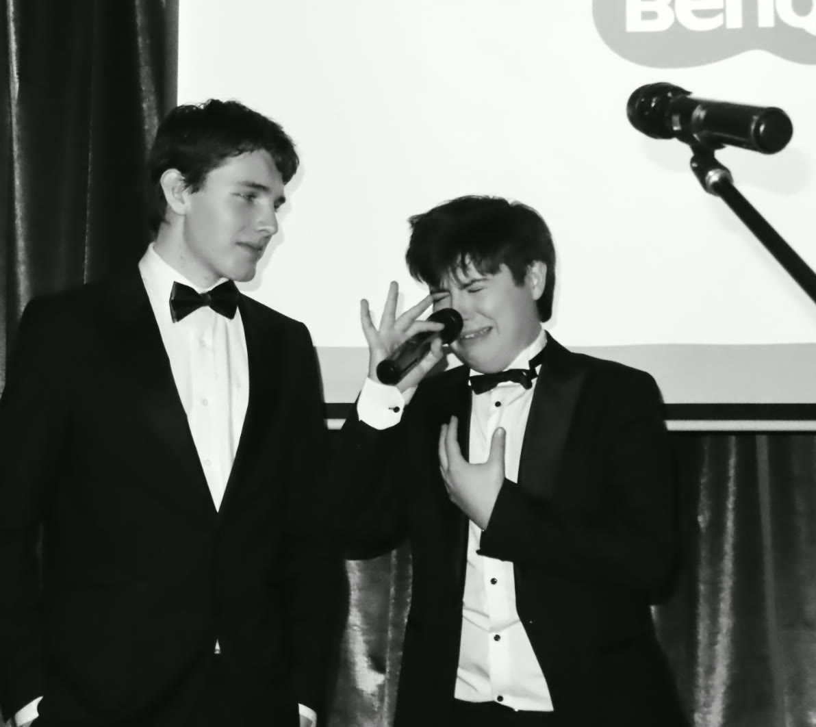 Two people on stage at the Engineering Society Ball
